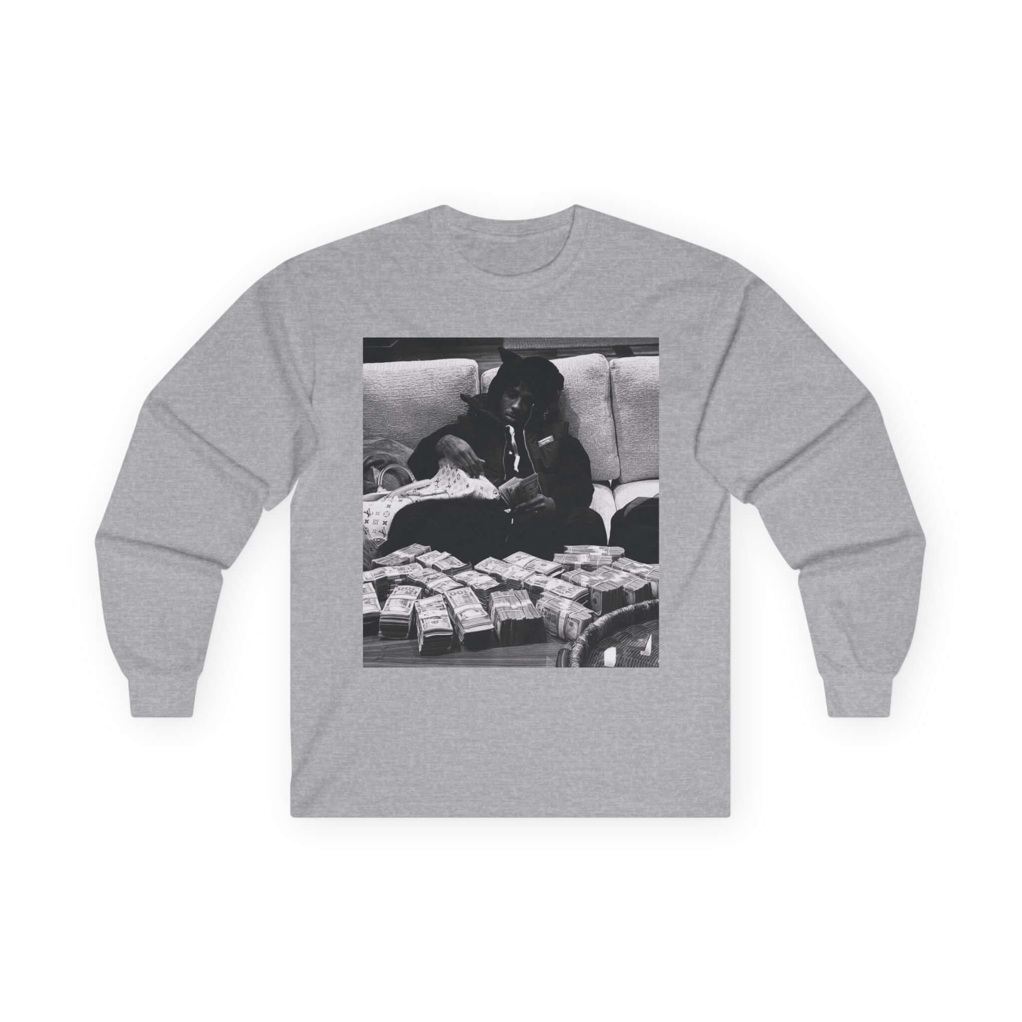 YoungBoy moneystack tee featuring a vintage gray long sleeve shirt with a monochrome photo of a person lounging with stacks of cash.