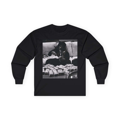 YoungBoy moneystack tee featuring a monochrome print of a person lounging with cash on a black long sleeve shirt.